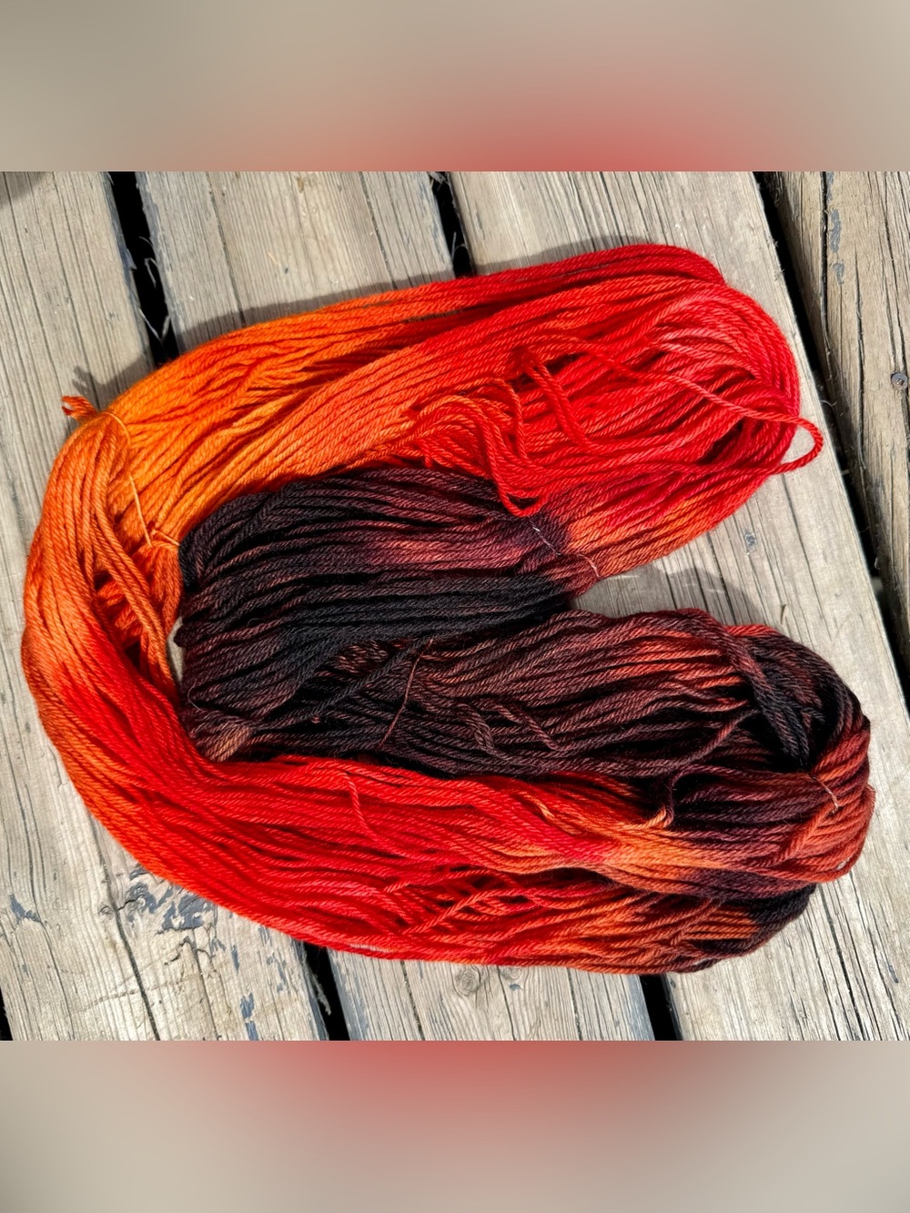Vibrant Gradient Fiber Art Skein in Red, Orange and Black